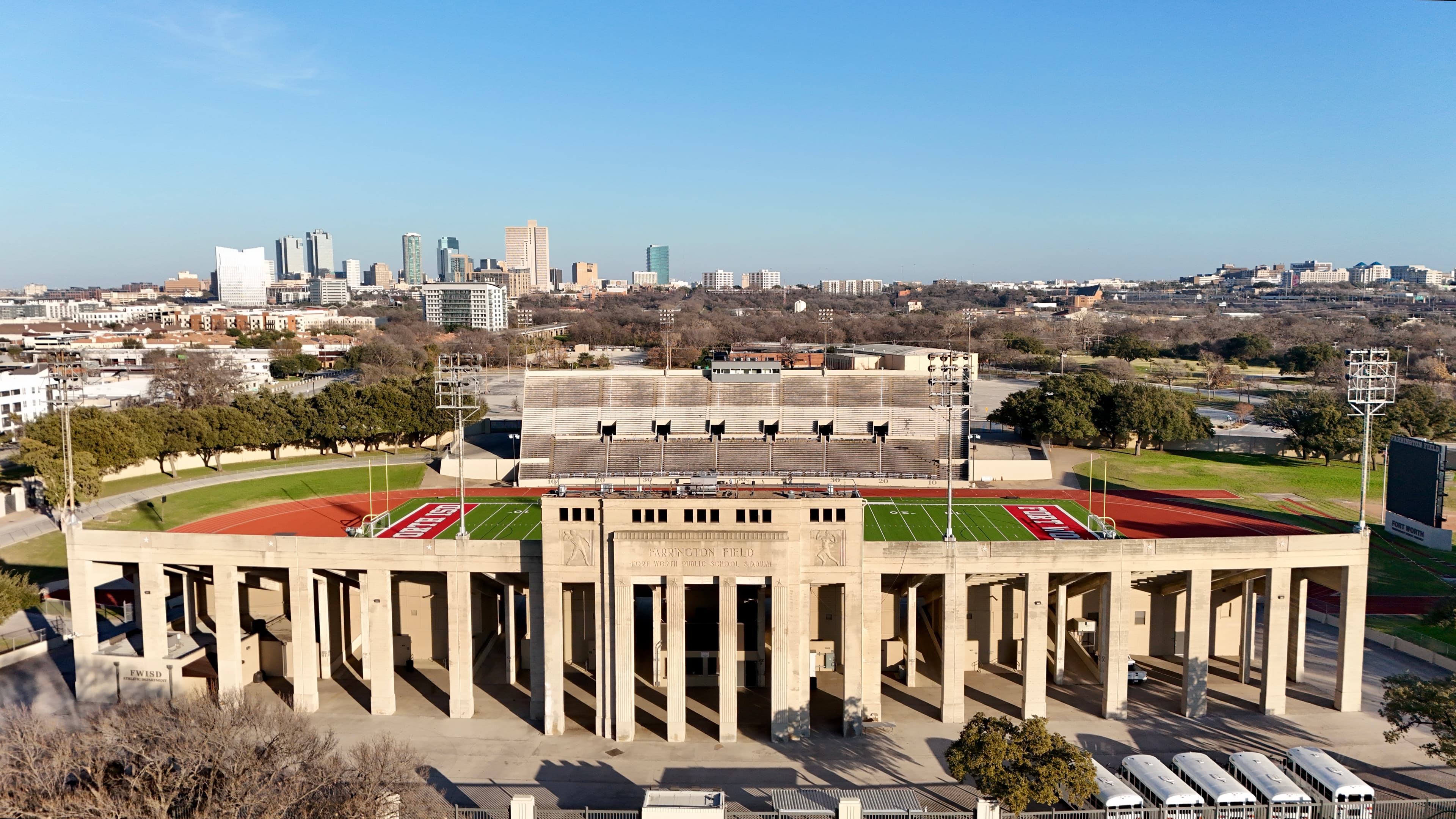 Aerial drone photo of Farrington Field stadium with Fort Worth skyline